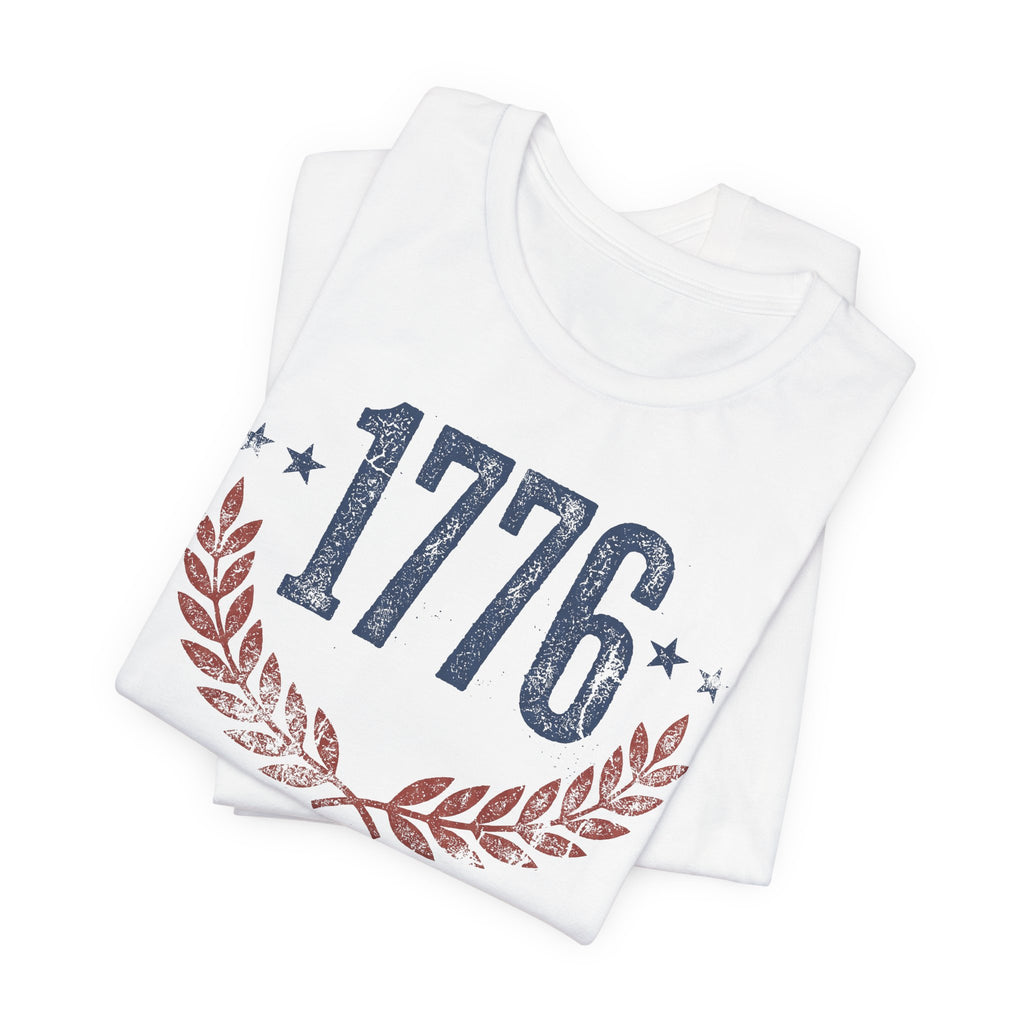 White T-shirt with “1776” graphic, stars, and laurel wreath