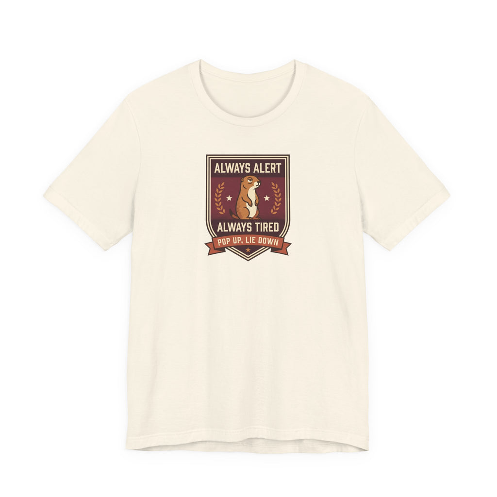 Cream T-shirt with squirrel crest badge graphic and “Always Alert Always Tired” text