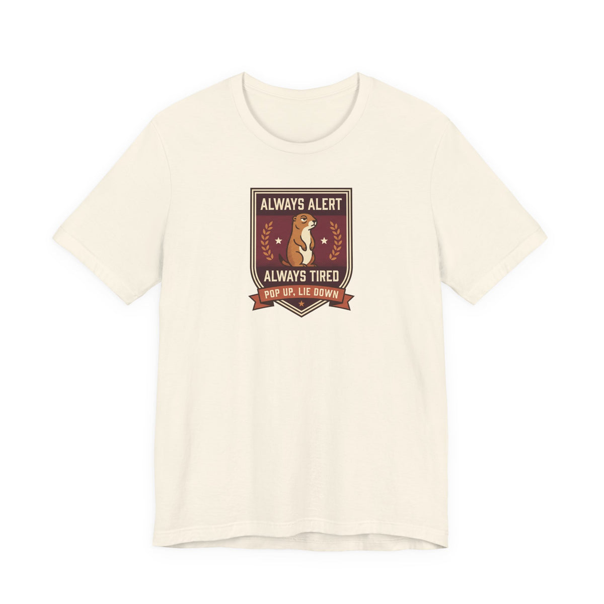 Cream T-shirt with squirrel crest badge graphic and “Always Alert Always Tired” text