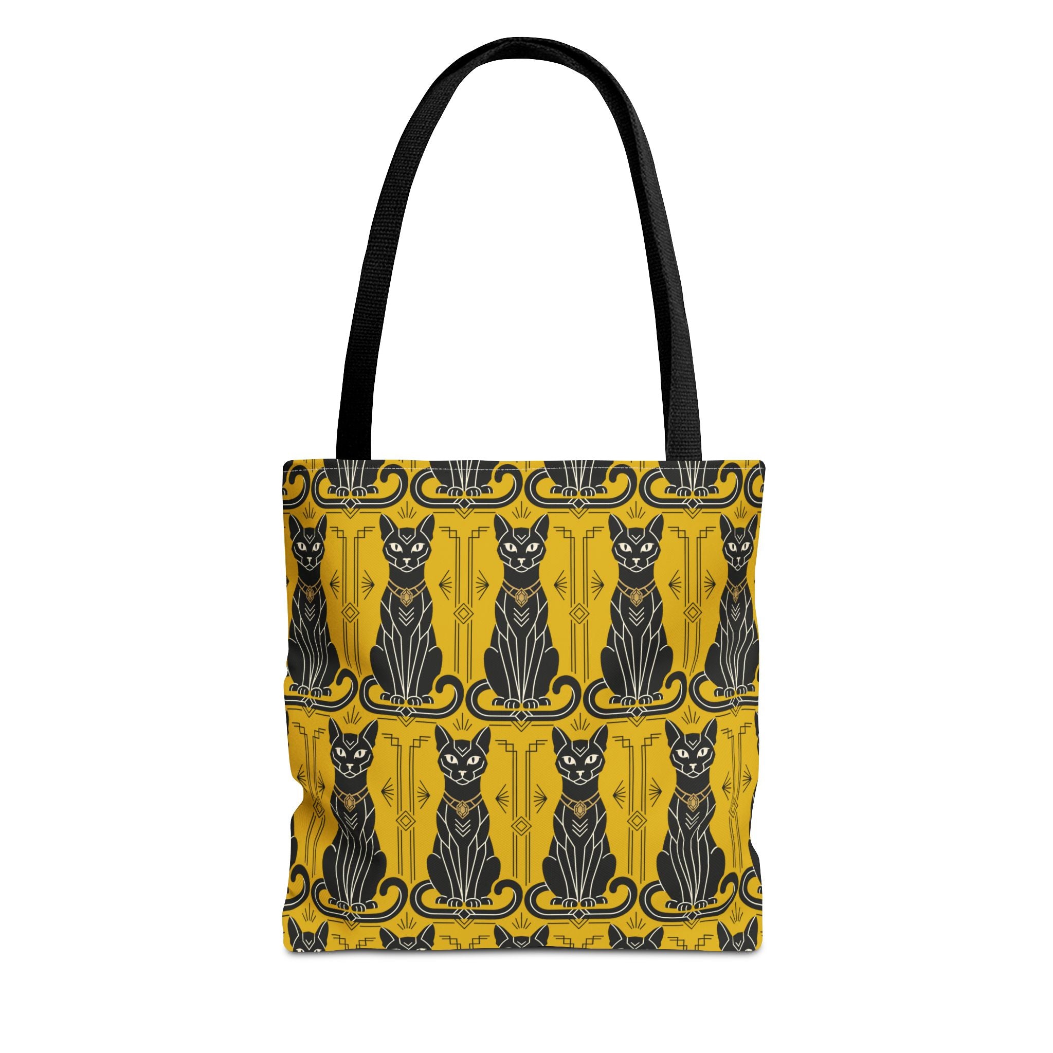 Tote bag with yellow cat pattern, blue-and-black cat faces, black top handles.