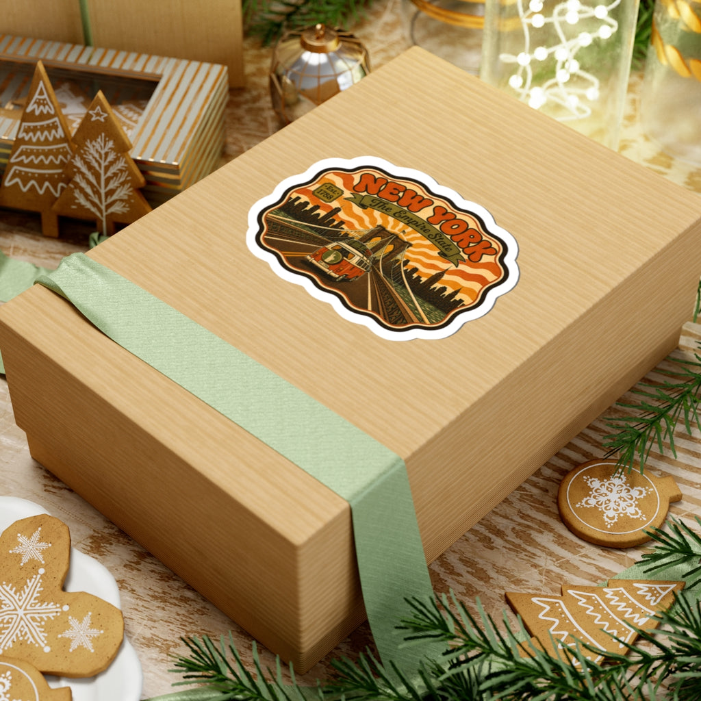 Kiss-cut vinyl sticker featuring 'NEW YORK' retro cityscape, orange camouflage background, and van.