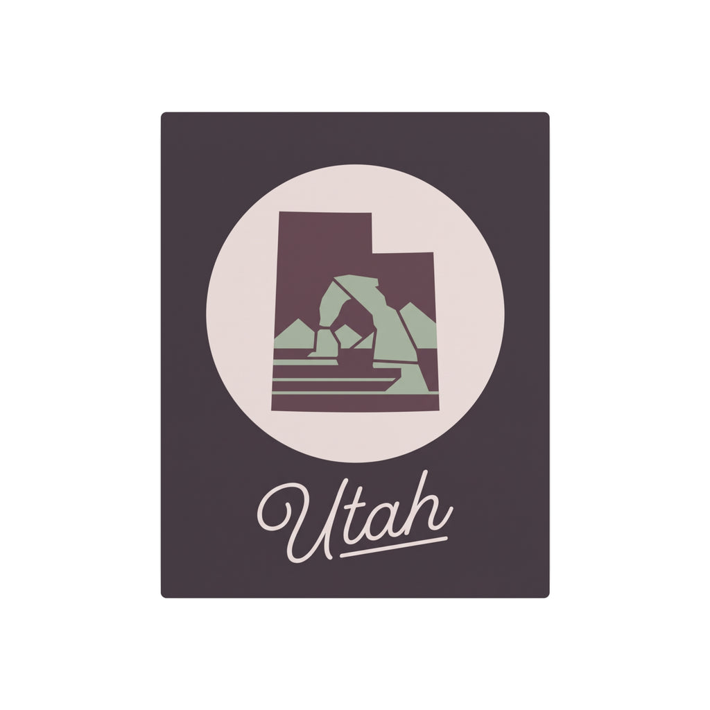 Square dark metal wall art featuring a circular Utah emblem and “Utah” lettering