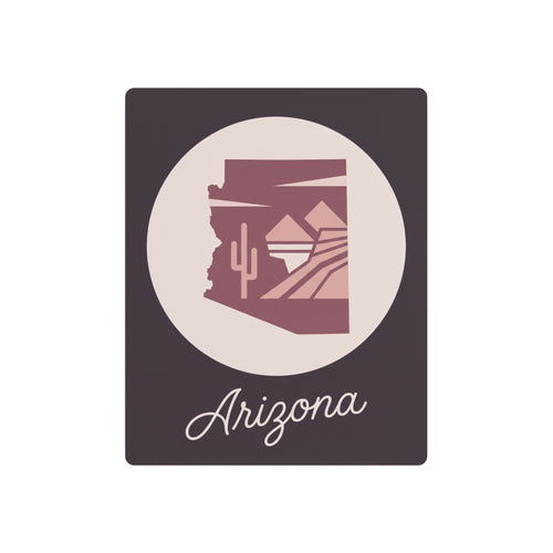 Mauve metal wall art with circular desert silhouette and cursive 'Arizona' text