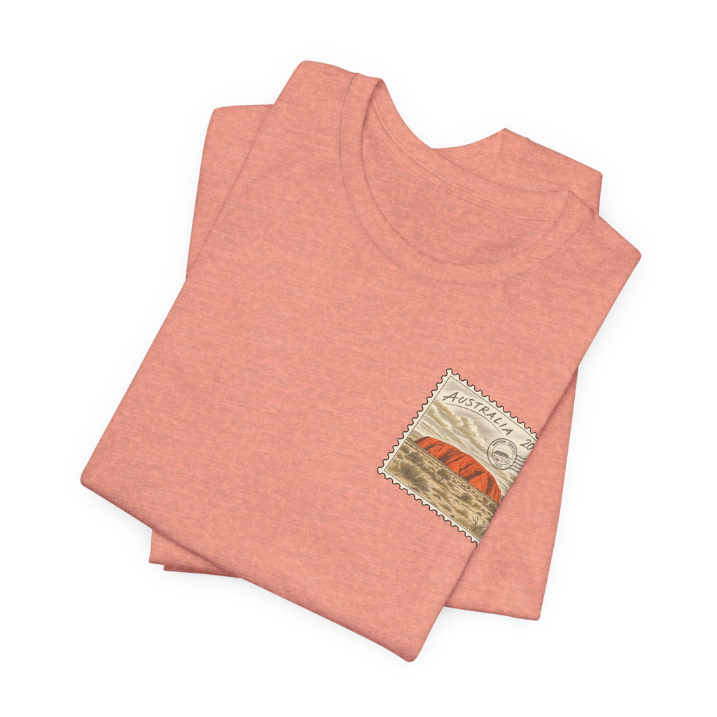 Rust red T-shirt with small Australia postage-stamp graphic on chest, two-piece view