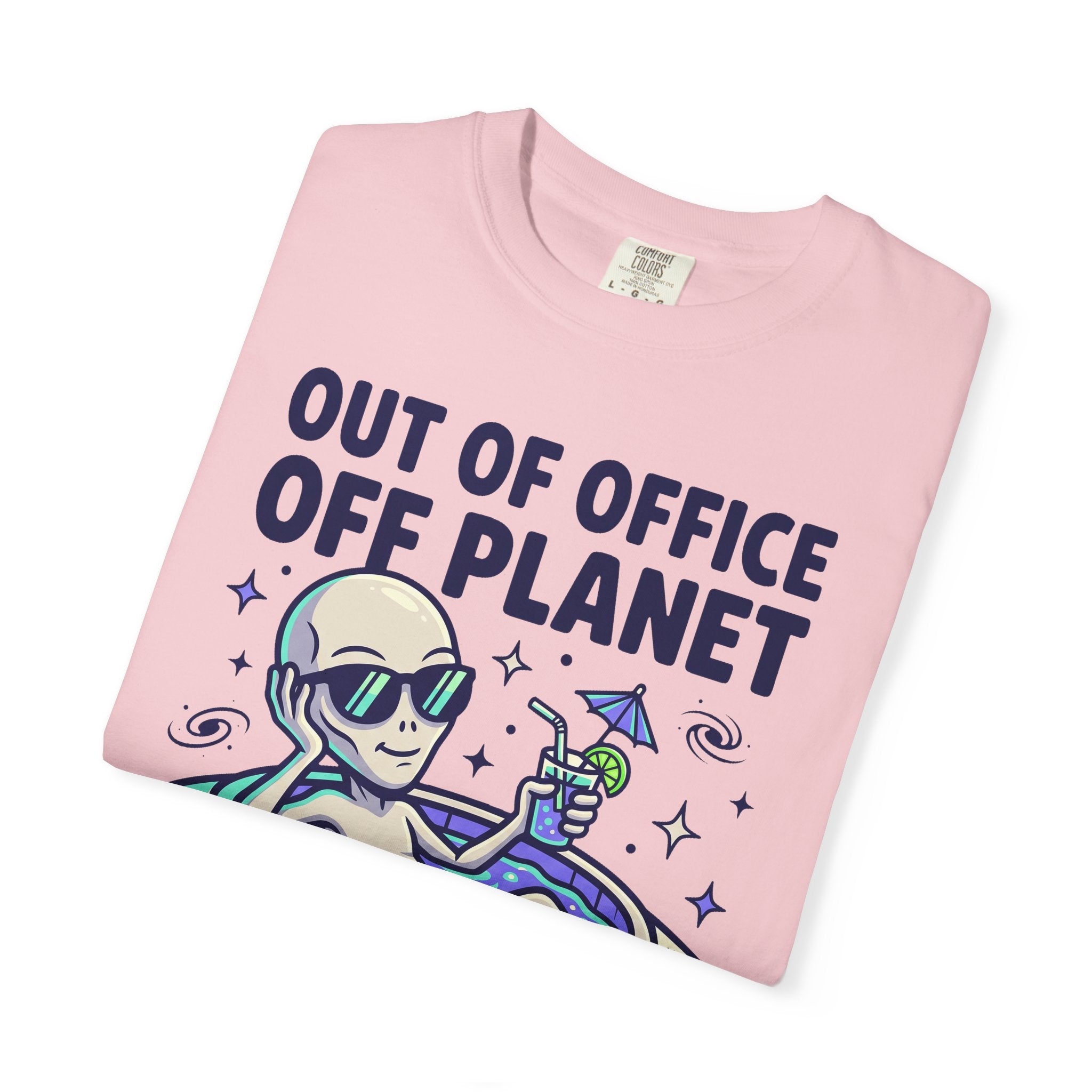 Pink crewneck T-shirt with alien floatie graphic and 'OUT OF OFFICE OFF PLANET' text
