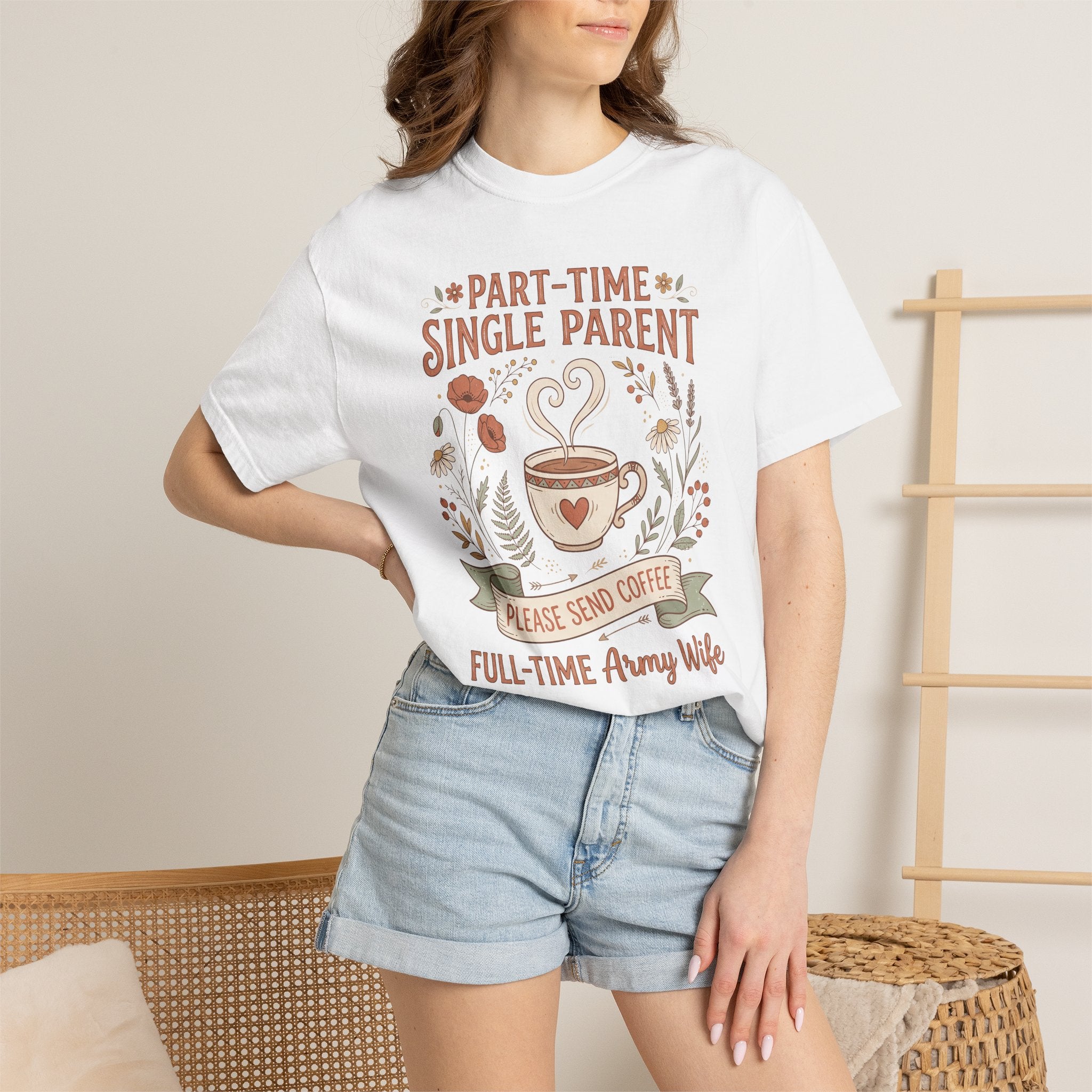 White t-shirt worn by model with floral coffee graphic and heart icon