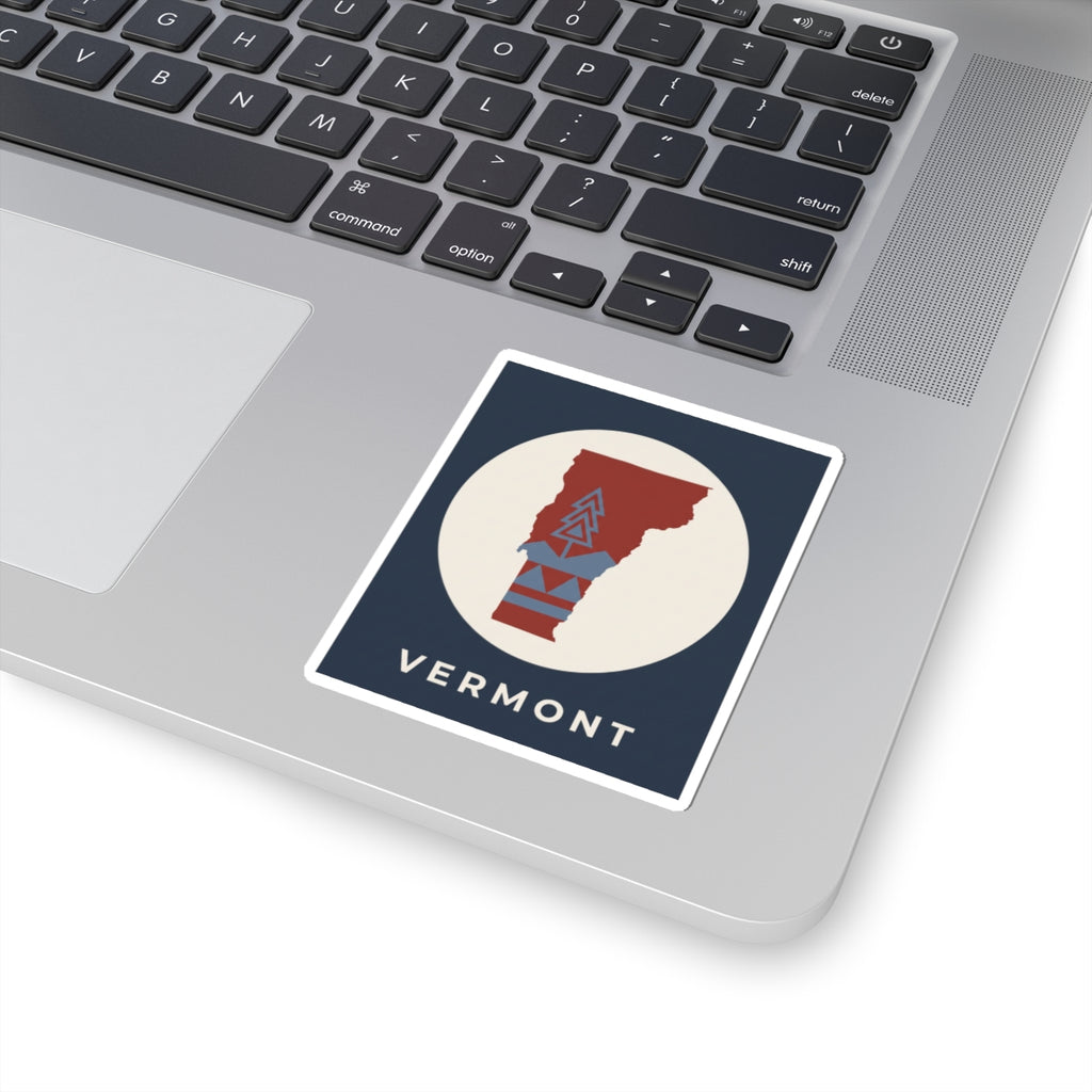 Vermont map sticker with navy frame, beige circle, red state and blue mountain artwork, 'VERMONT'