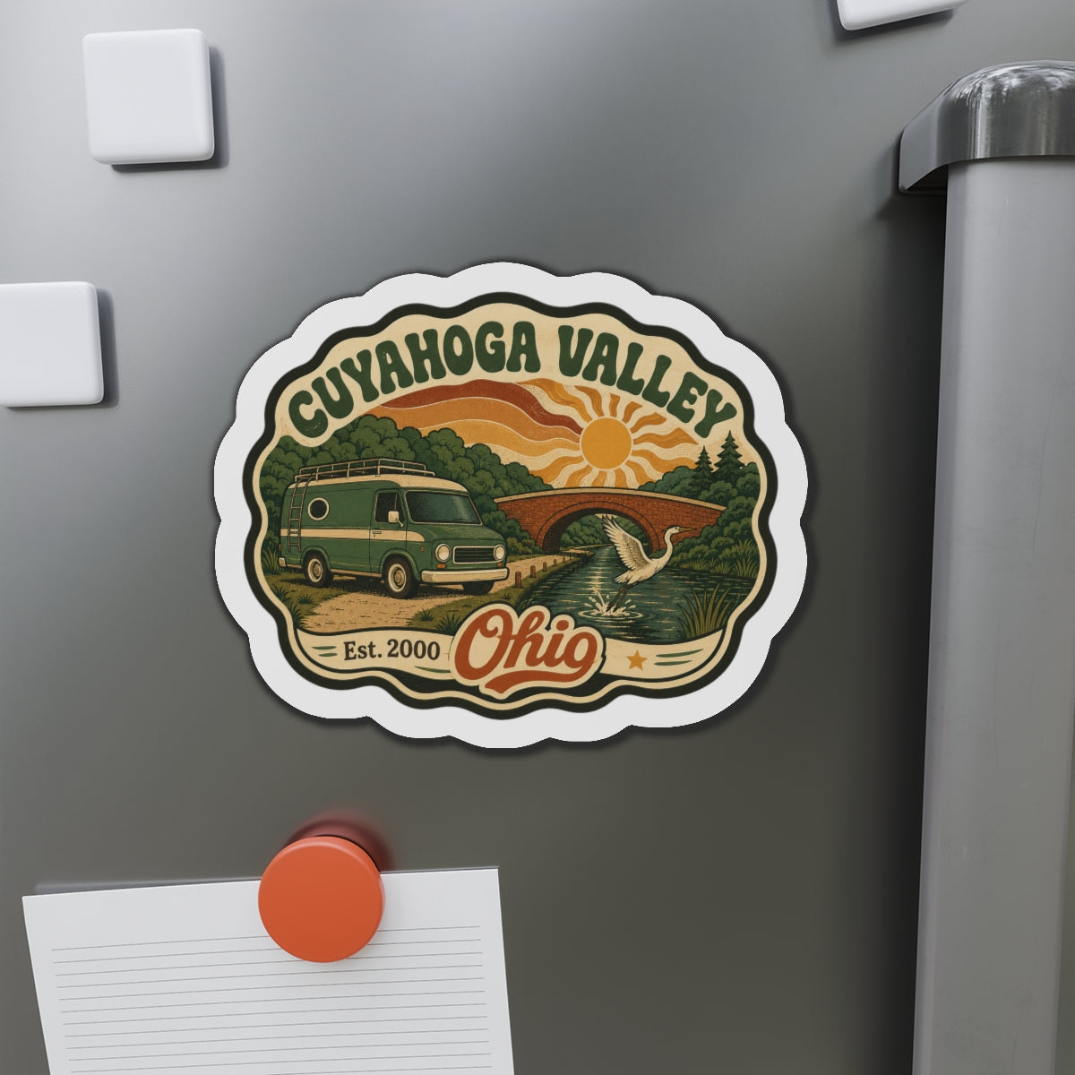 Scalloped die-cut Cuyahoga Valley camper van fridge magnet with river and sunrise colors