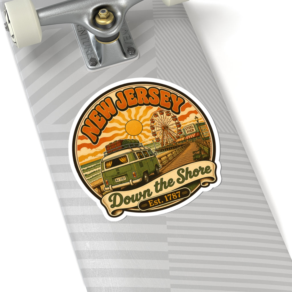 Round sticker on a skateboard deck, showing New Jersey beach scene with van and ferris wheel.