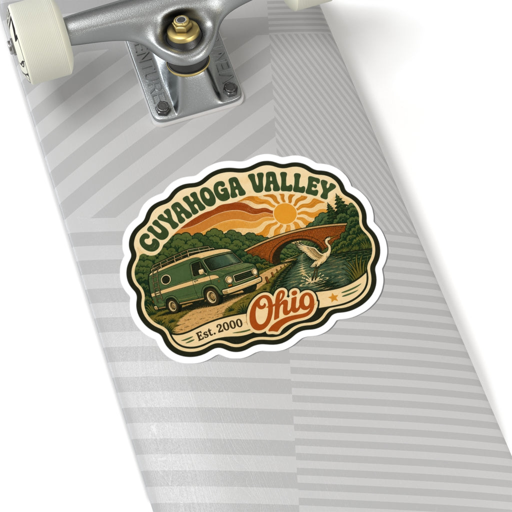 Die-cut Cuyahoga Valley sticker with green camper van, sunset, heron, and Ohio script