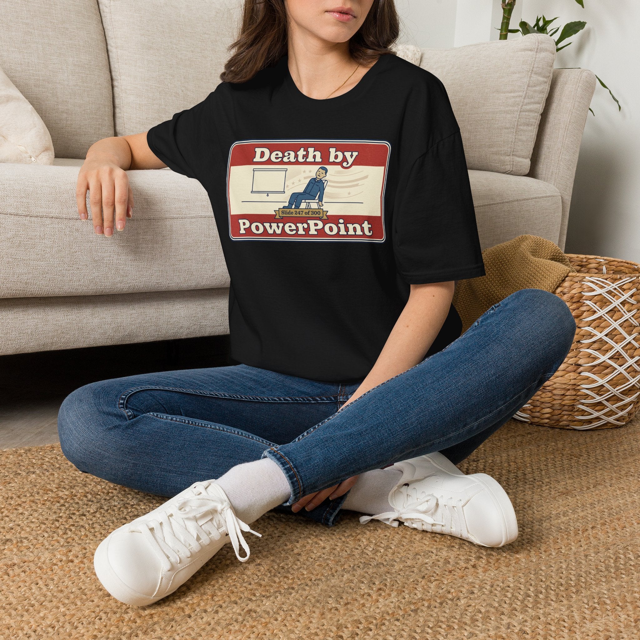 Black T-shirt worn by model, featuring 'Death by PowerPoint' graphic