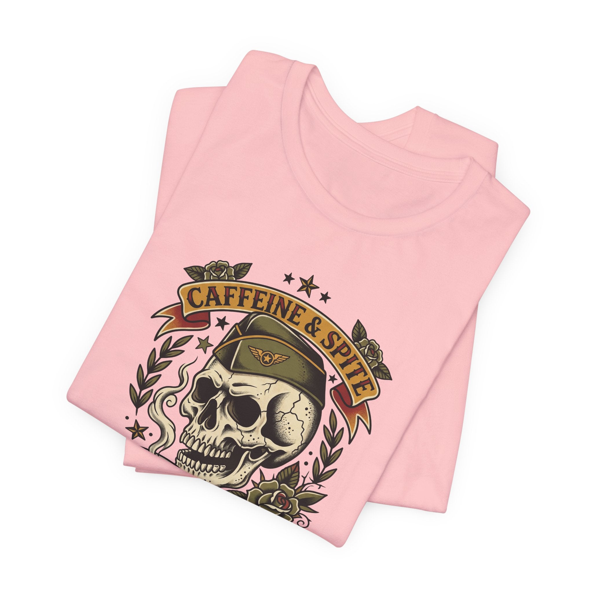 Light pink T-shirt with front skull and “CAFFEINE & SPITE” banner graphic