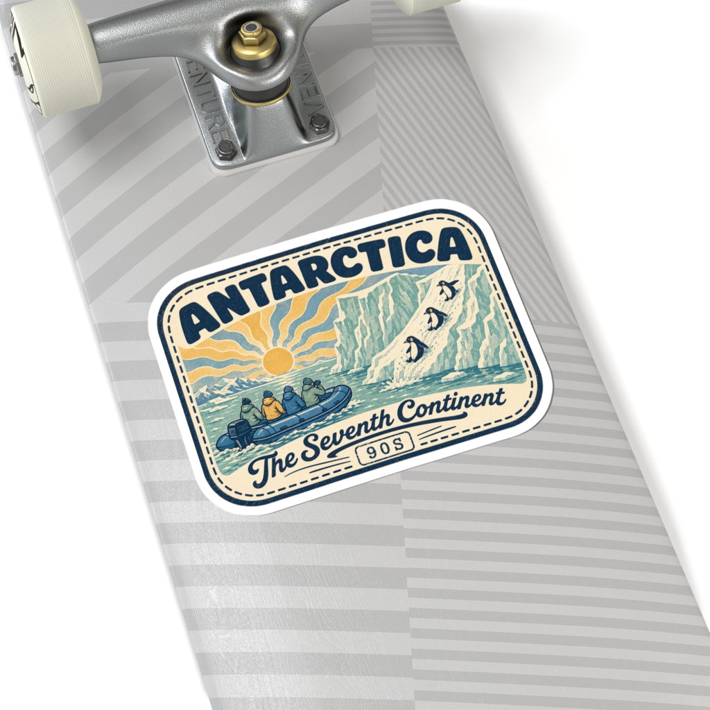 Antarctica badge sticker on a striped notebook page, vintage penguins and “The Seventh Continent”
