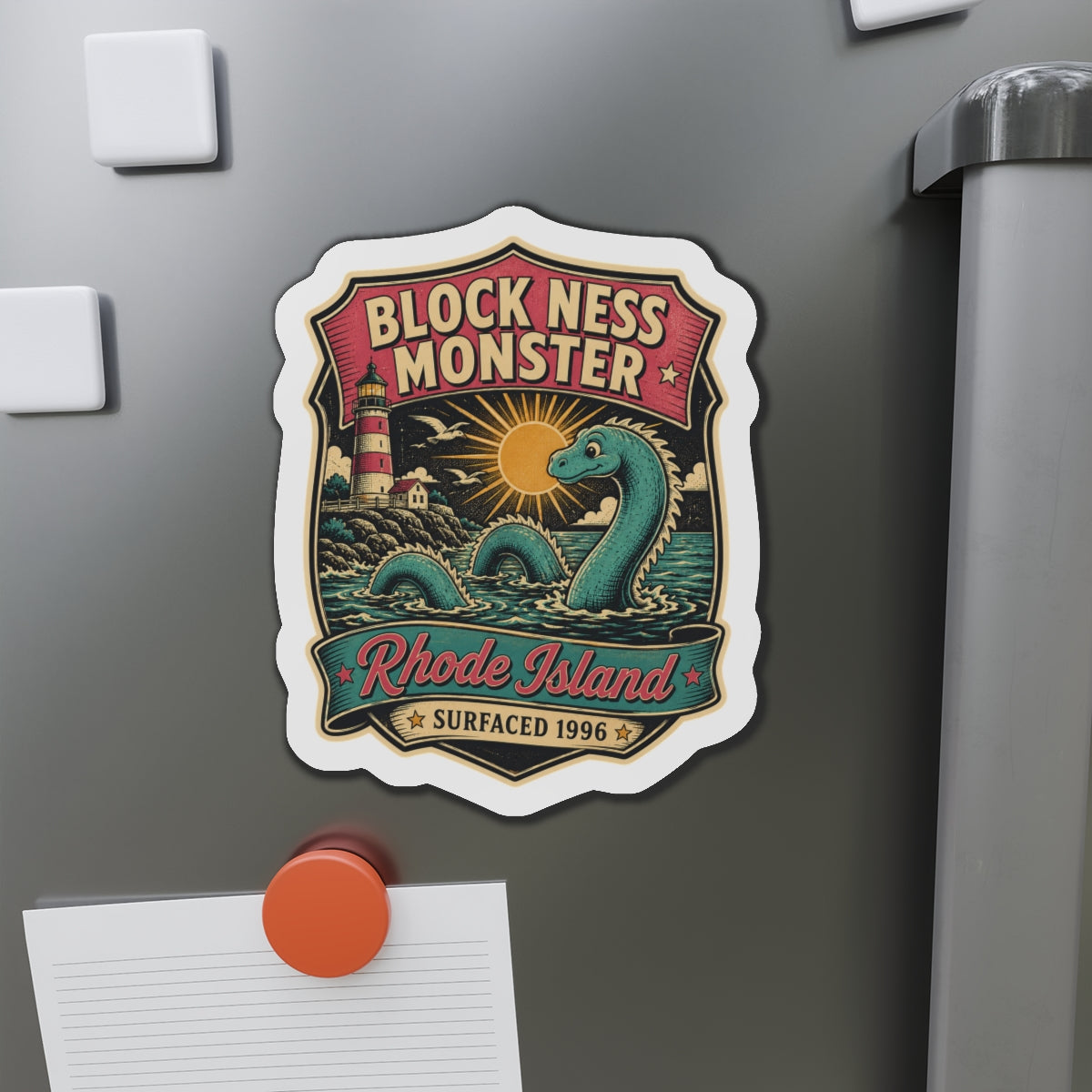 Die-cut magnet sticker showing teal sea monster, sun, lighthouse, and Rhode Island badge