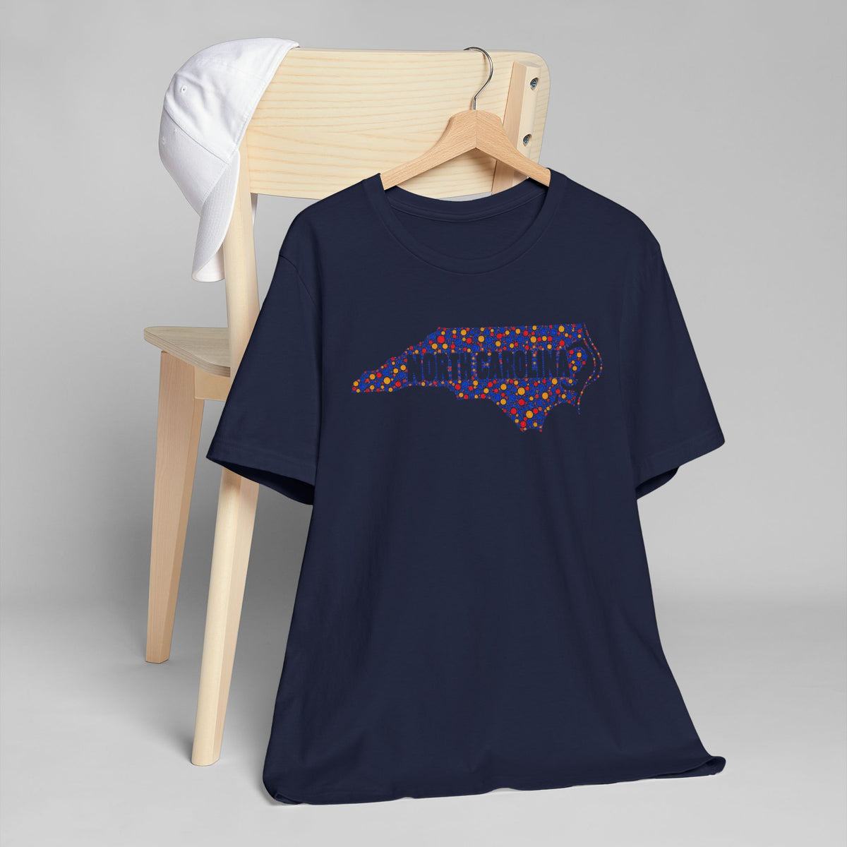 Navy crewneck short-sleeve T-shirt with colorful North Carolina map graphic