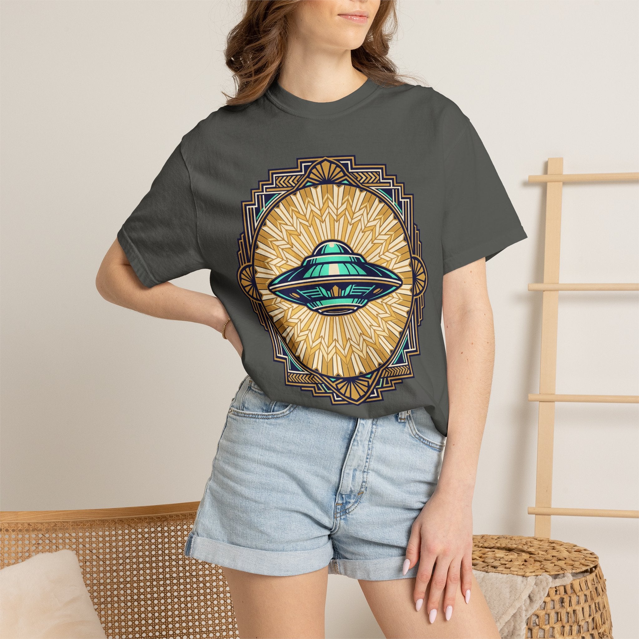 Charcoal crew-neck t-shirt with retro UFO graphic and gold sunburst on front.