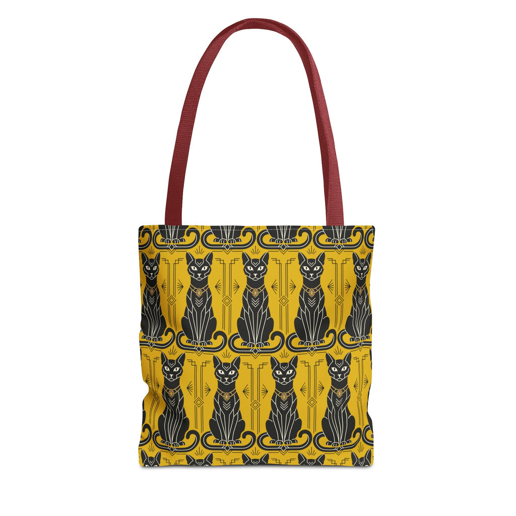 Tote bag with yellow cat print, blue-and-black cat faces, burgundy top handles.
