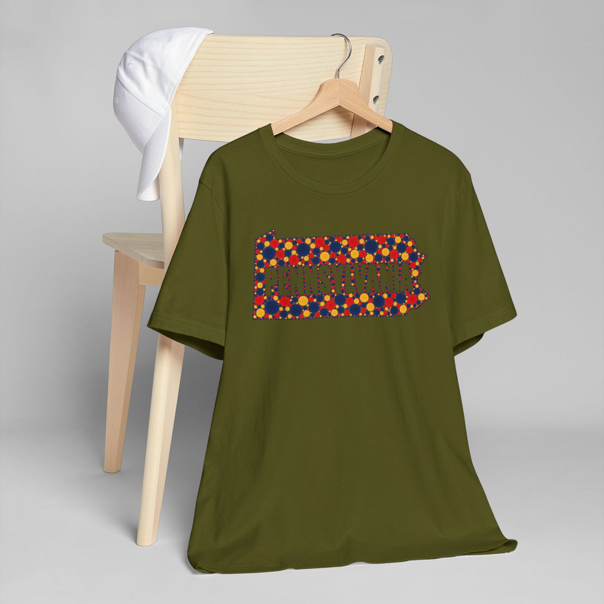 Olive short-sleeve T-shirt with colorful floral Pennsylvania outline graphic
