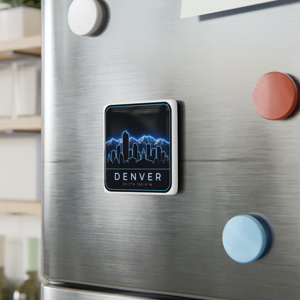 Square white porcelain magnet on stainless fridge with neon Denver skyline design