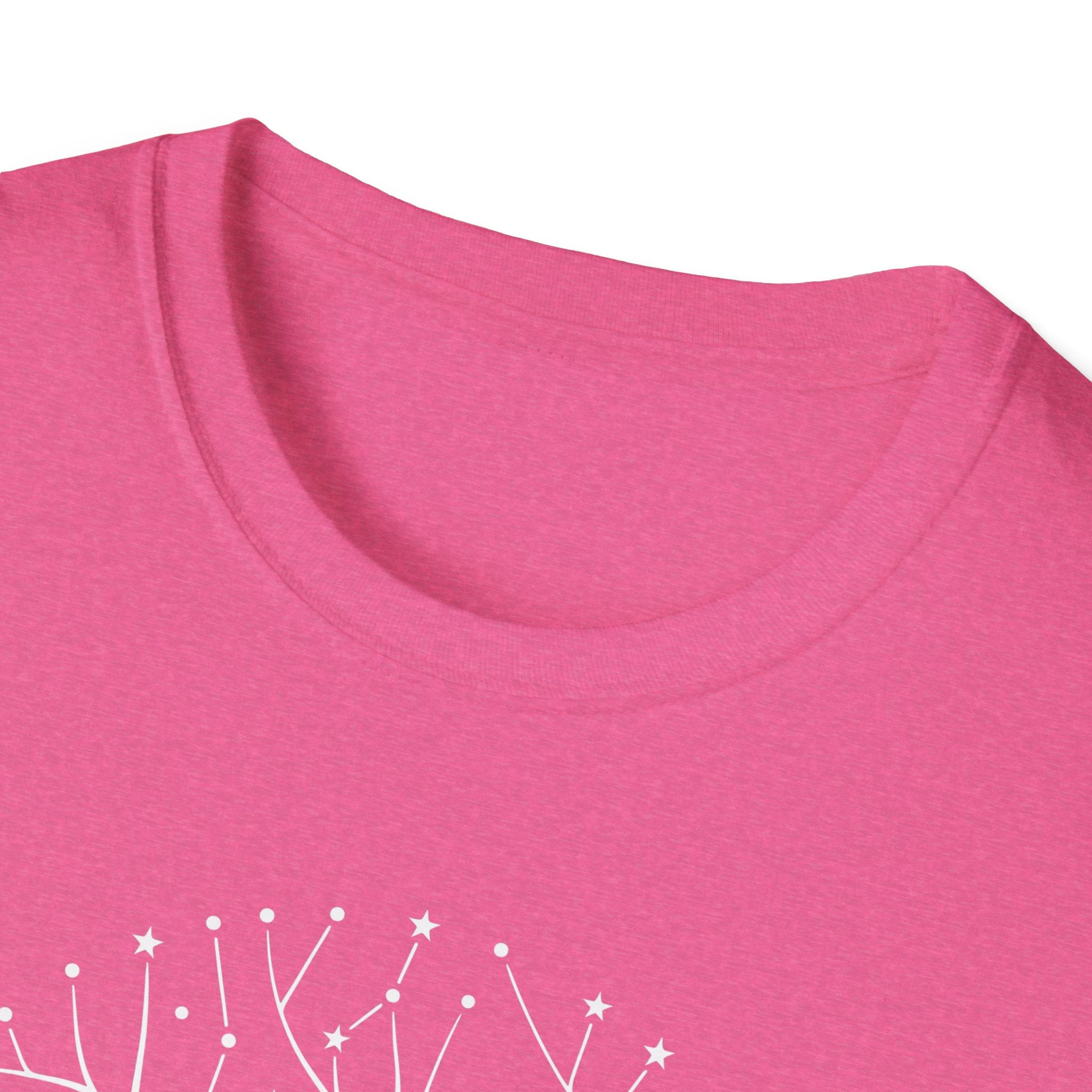 Pink T-shirt with crew neck; partial white star-and-tree roots graphic near hem.