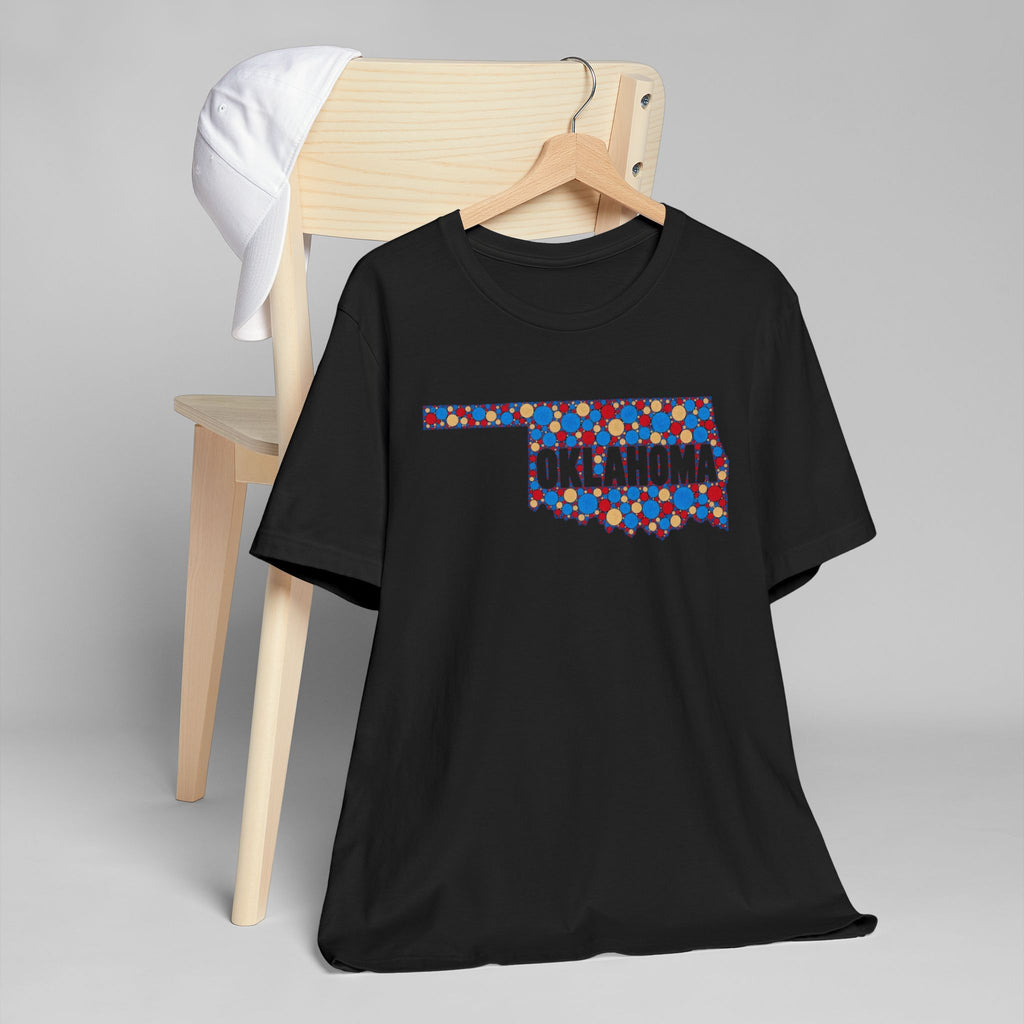 Black crew-neck t-shirt with colorful Oklahoma floral map graphic.