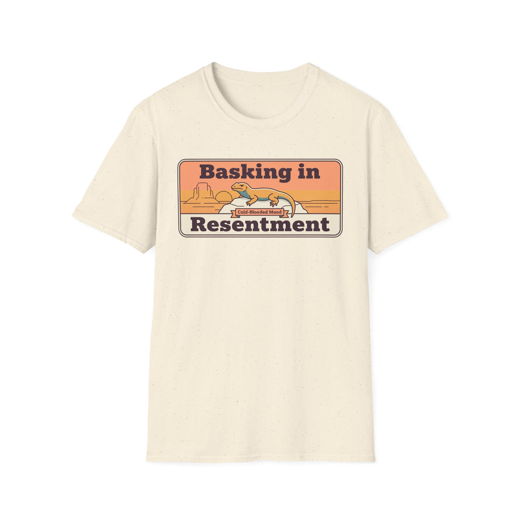 Cream crew-neck T-shirt with “Basking in Resentment” desert lizard graphic.