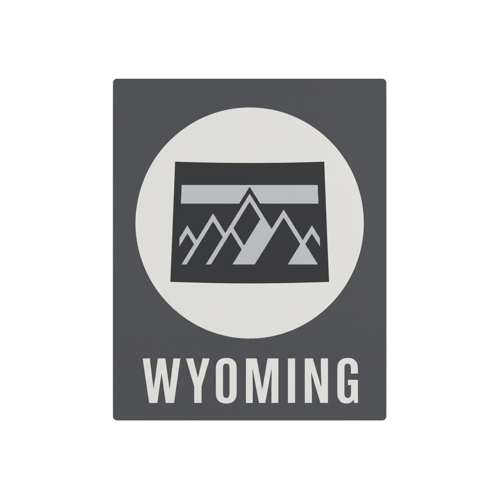 Wyoming metal wall plaque with dark gray square, white oval, mountain badge, and WYOMING lettering