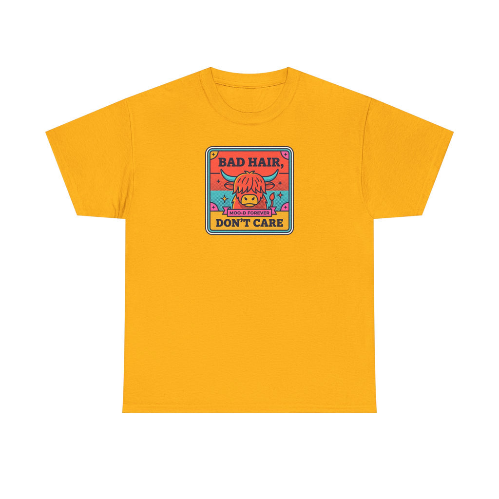Gold/yellow t-shirt with square cow graphic reading “Bad Hair Don’t Care”.