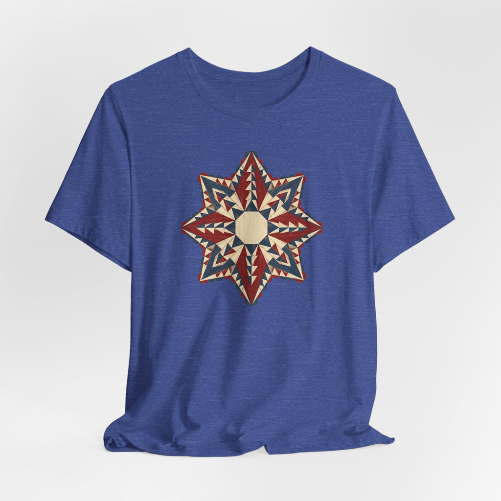 Blue crewneck T-shirt with center star mandala graphic in red, cream, and tan