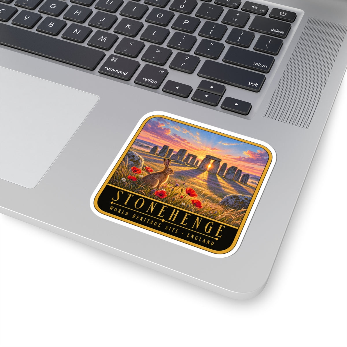 Kiss-cut vinyl decal sticker, rounded square with Stonehenge sunrise and rabbit in flowers.