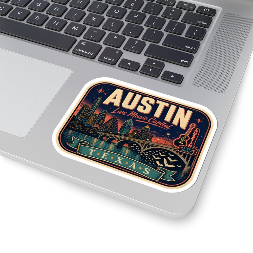 Austin luggage tag sticker on laptop, bold “AUSTIN” lettering with “Texas” ribbon