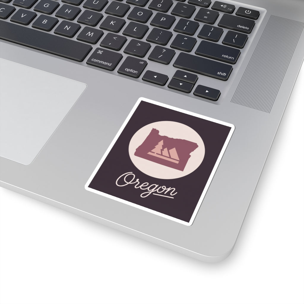 Square kiss-cut Oregon decal sticker with circular state emblem and cursive Oregon word