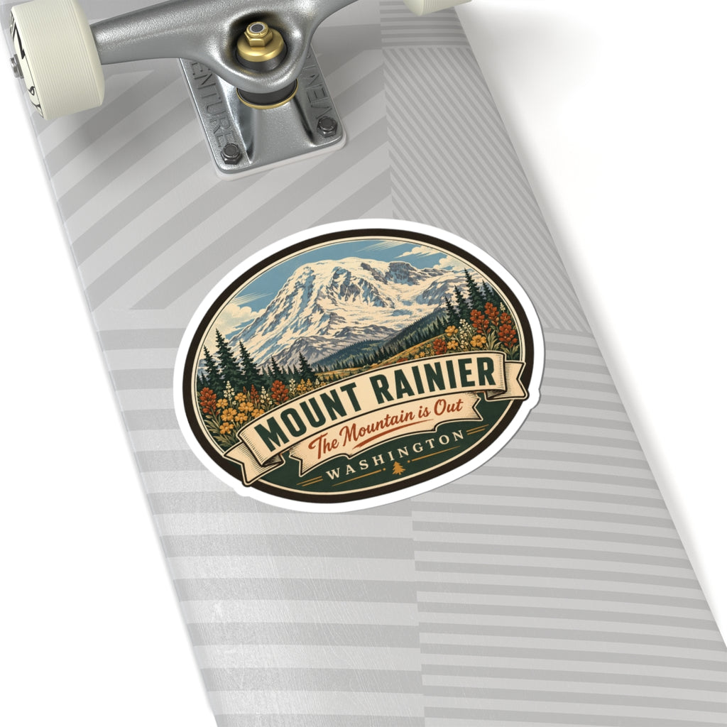 Oval Mount Rainier travel sticker on notebook page, mountain artwork with WASHINGTON text