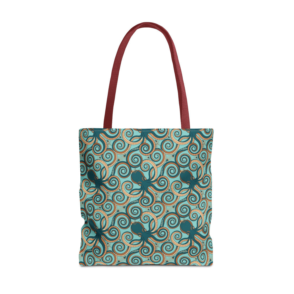 Teal tote bag with all-over octopus swirl pattern and red handles