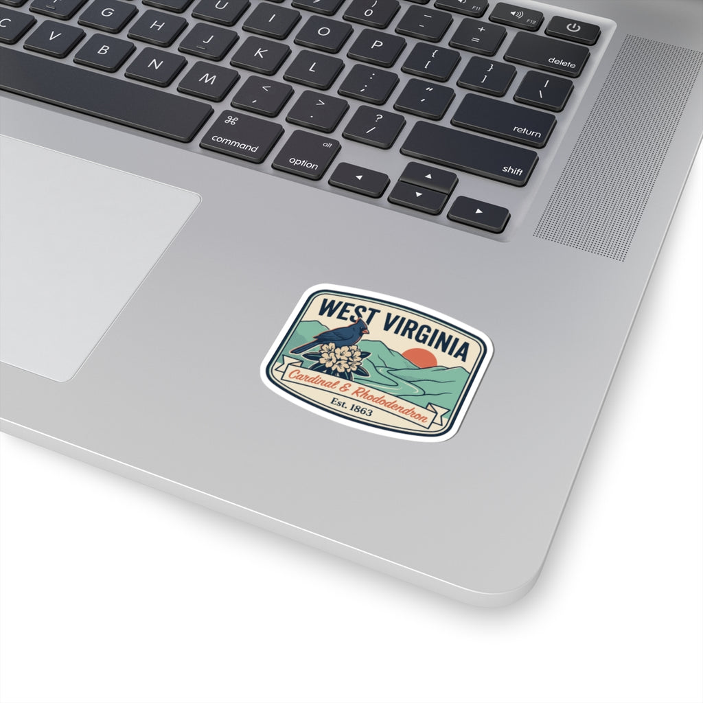 West Virginia vintage badge sticker with cardinal and rhododendron, on laptop