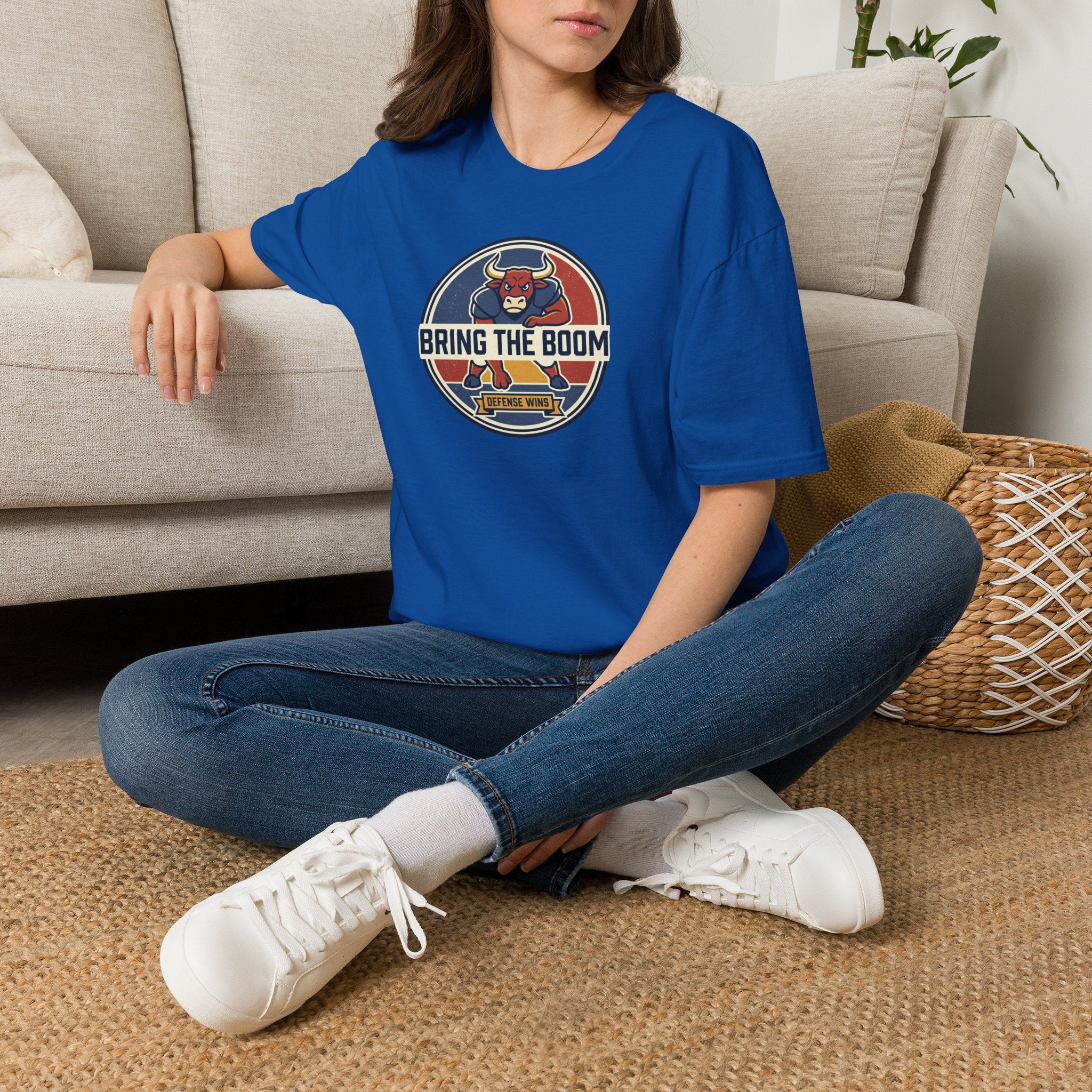 Royal blue crew-neck T-shirt with round bull mascot graphic on the chest
