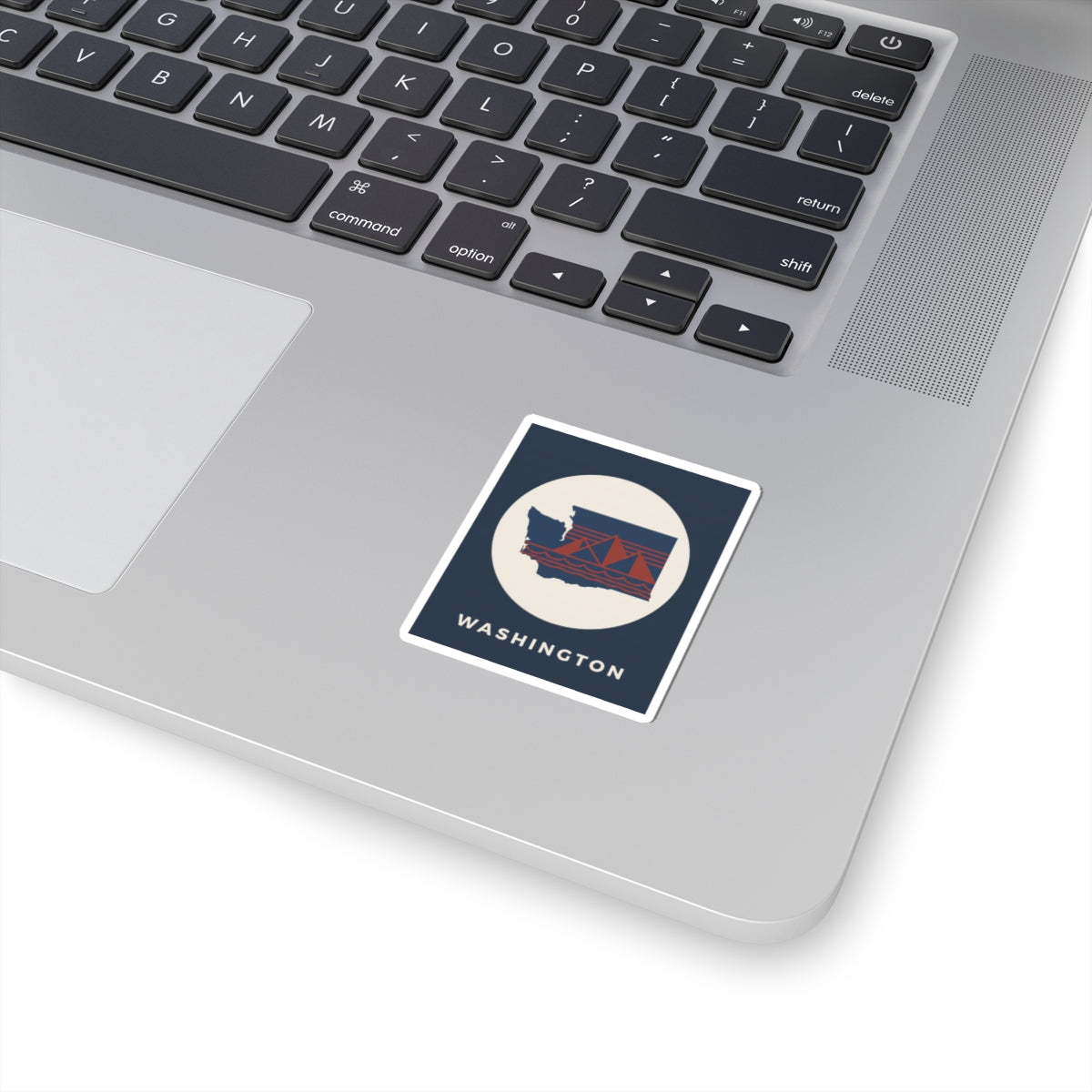 Square kiss-cut sticker with Washington state graphic, dark blue border and red landscape