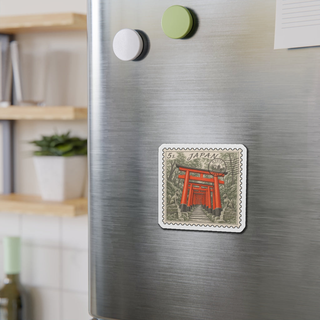 Torii stamp die-cut magnet on stainless refrigerator door, surrounded by round magnets