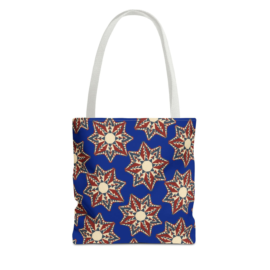Blue tote bag with starburst floral pattern and light gray handles