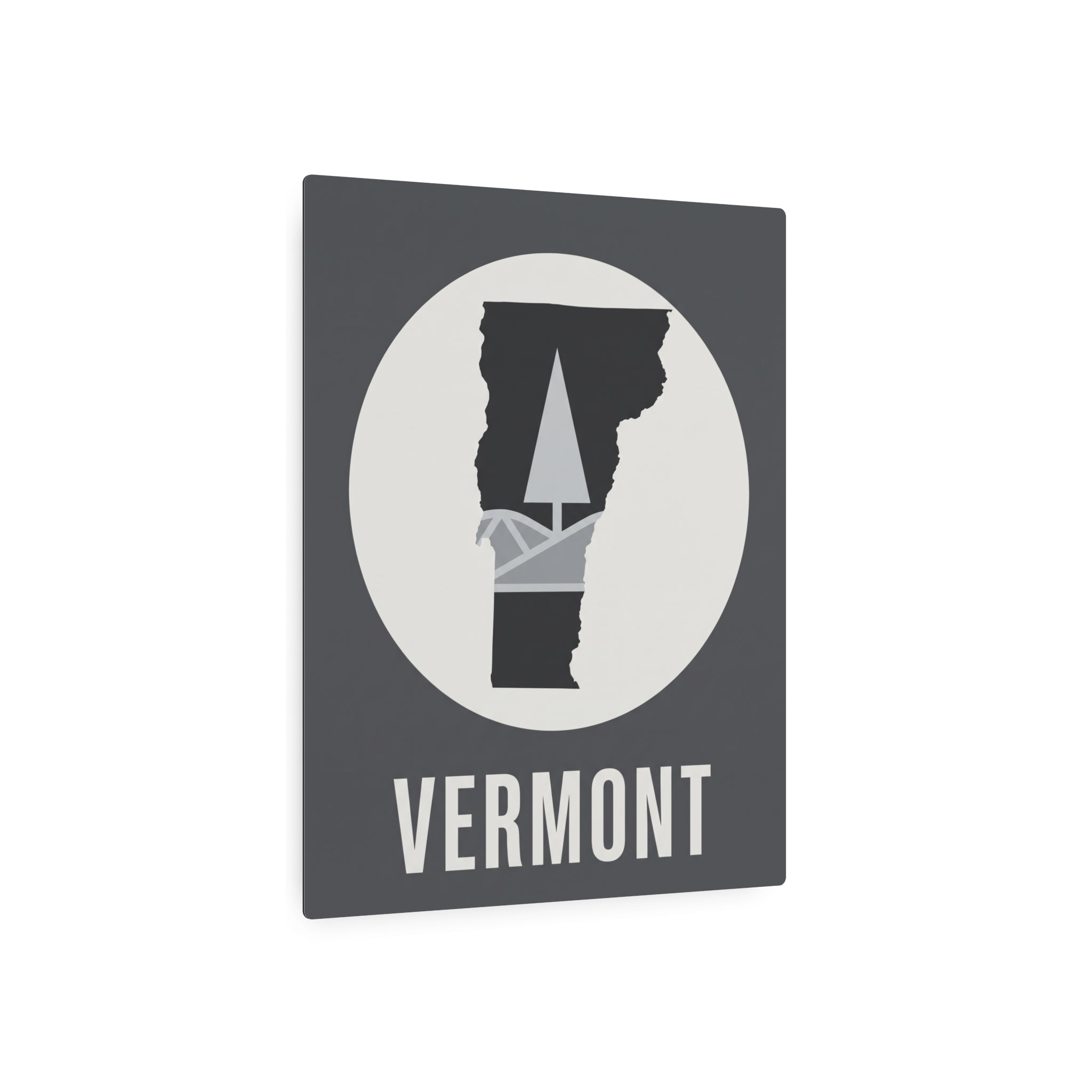 Dark gray square Vermont wall art with circular pine-tree silhouette and “VERMONT” text.