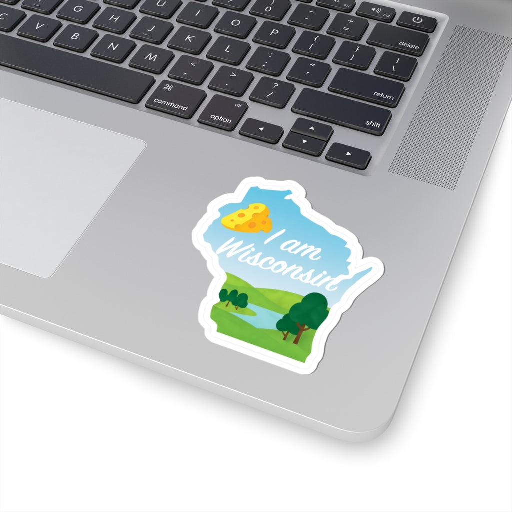 I am Wisconsin sticker on laptop, blue Wisconsin map with cheese and trees