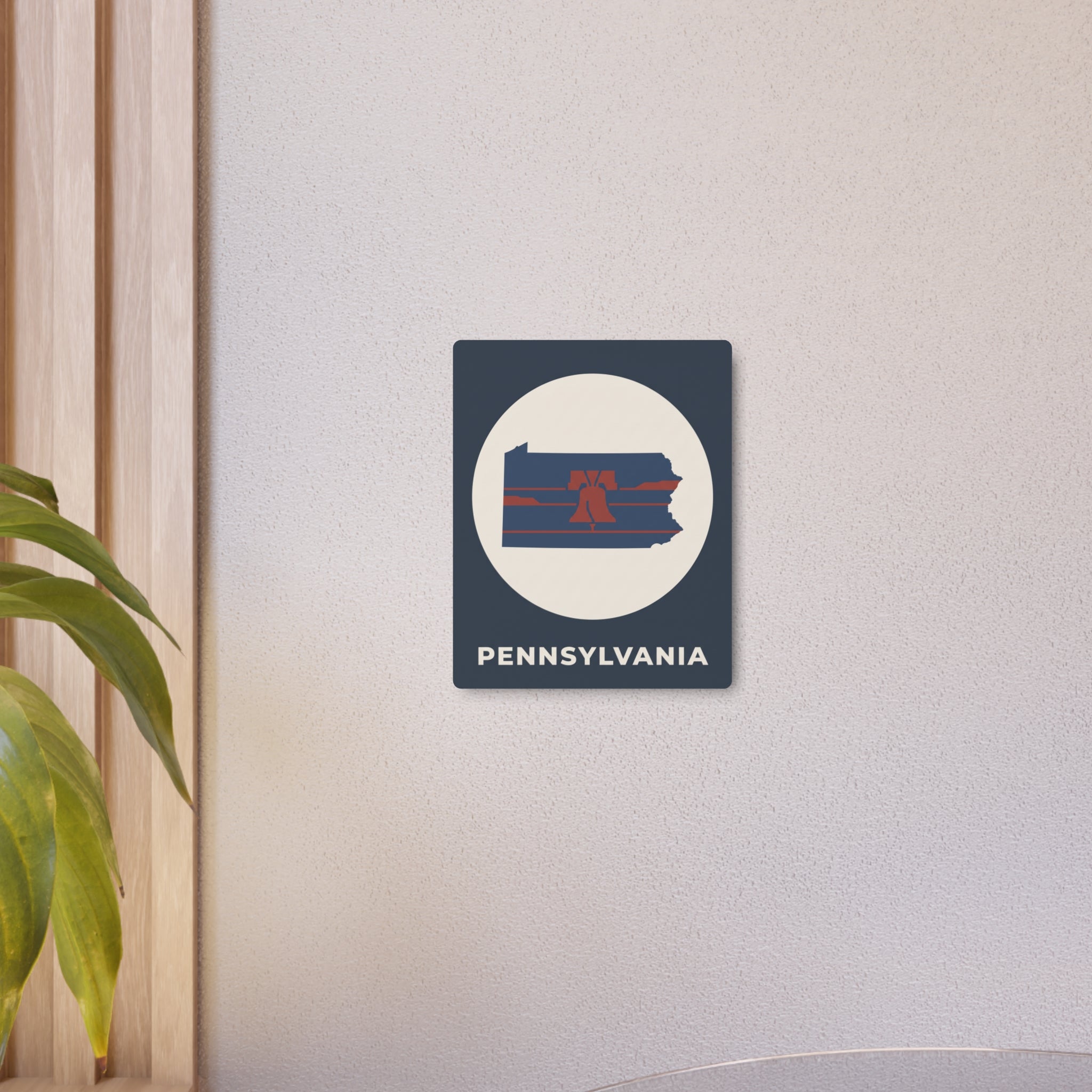 Small dark blue Pennsylvania Liberty Bell outline wall plaque with oval emblem and PENNSYLVANIA