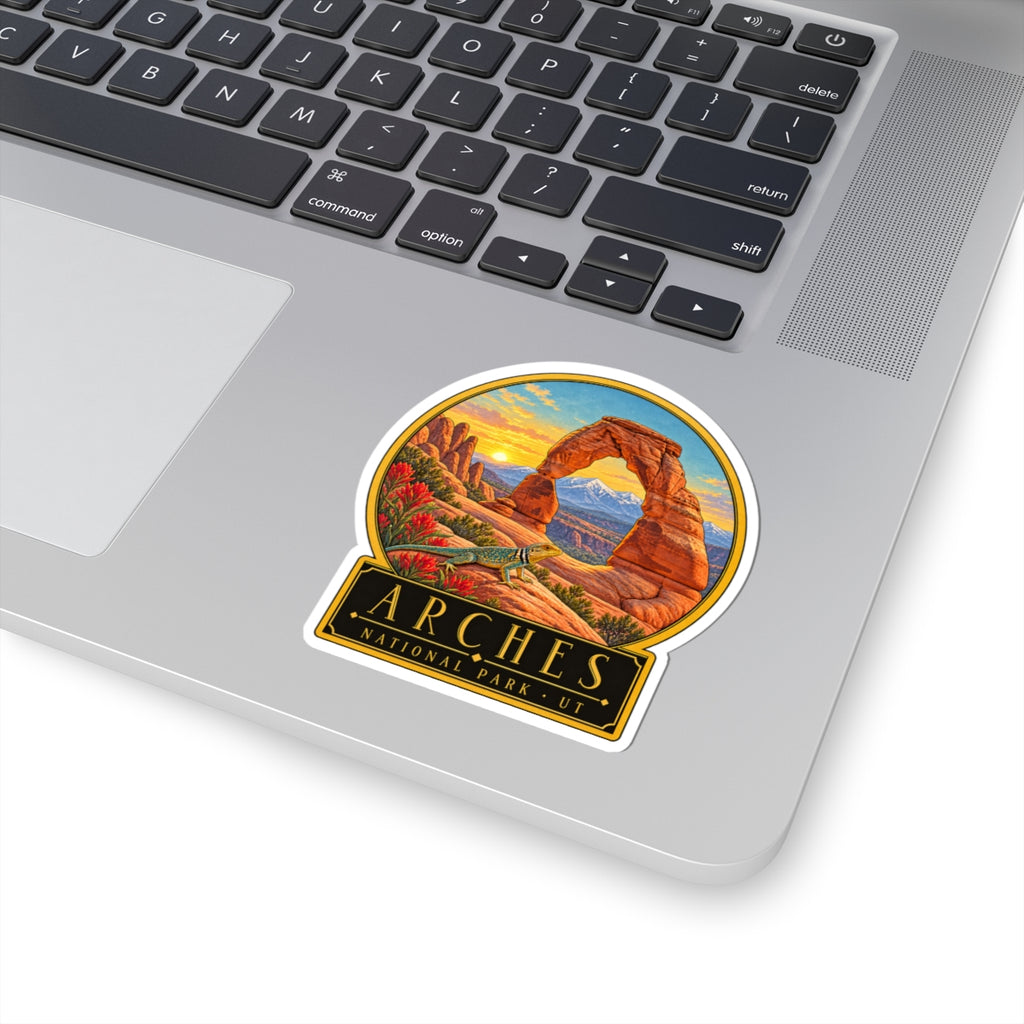 Angled Arches National Park kiss-cut vinyl sticker with desert arch, green lizard, and UT text.