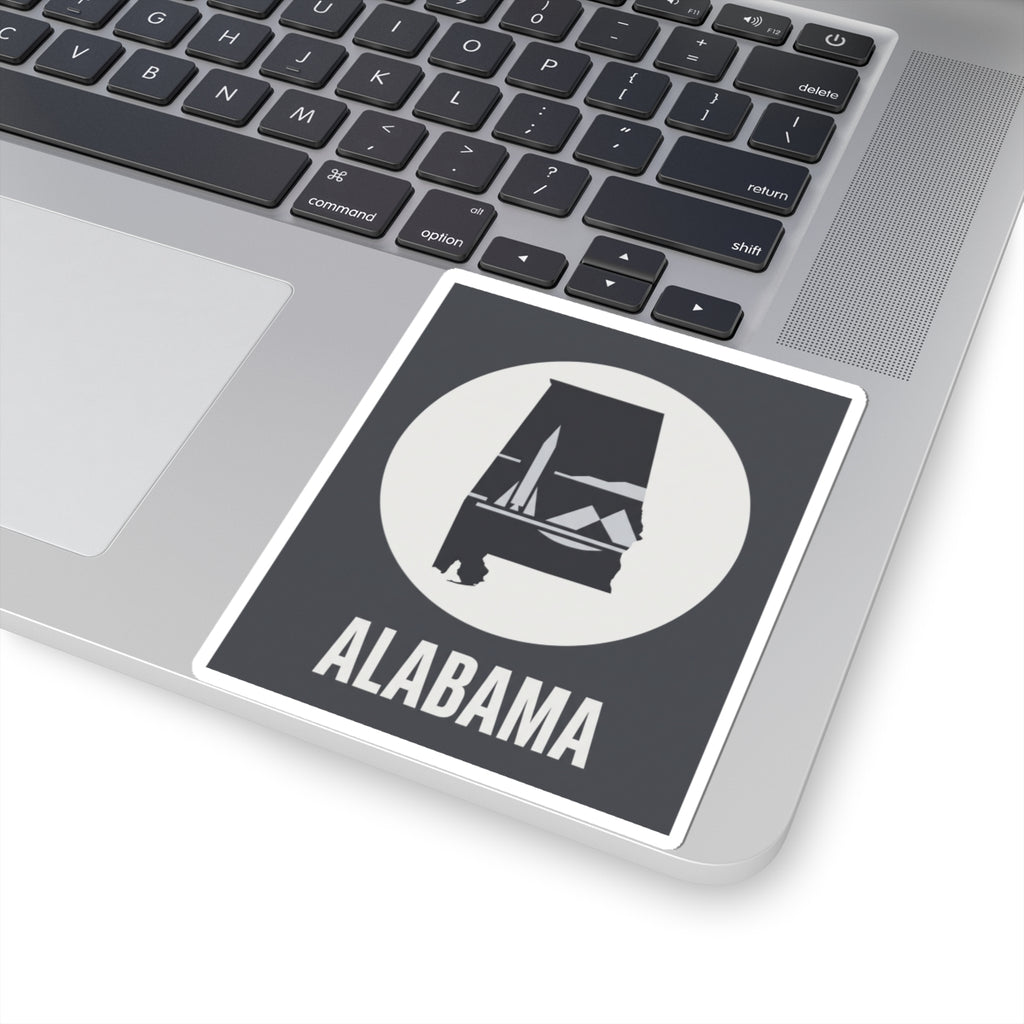 Alabama outline vinyl decal on laptop lid, square sticker with white circle emblem and “ALABAMA”