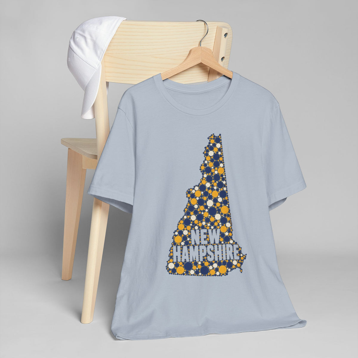 Light blue crew-neck t-shirt with floral New Hampshire triangle map graphic