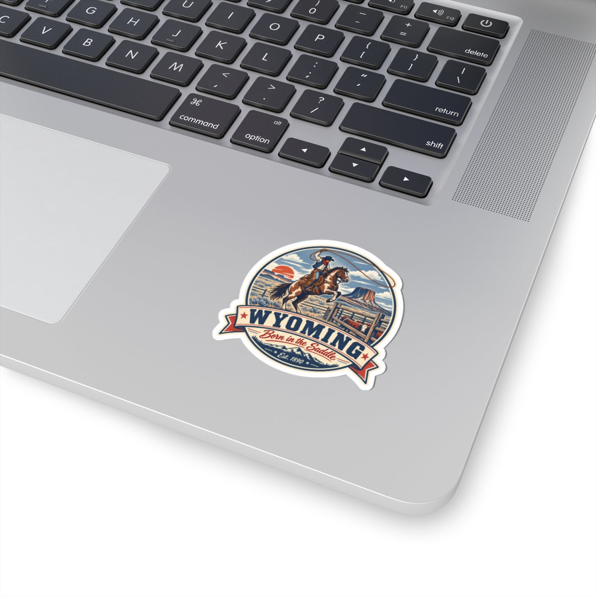 Die-cut Wyoming cowboy rodeo sticker with horse, rider, and “WYOMING” lettering