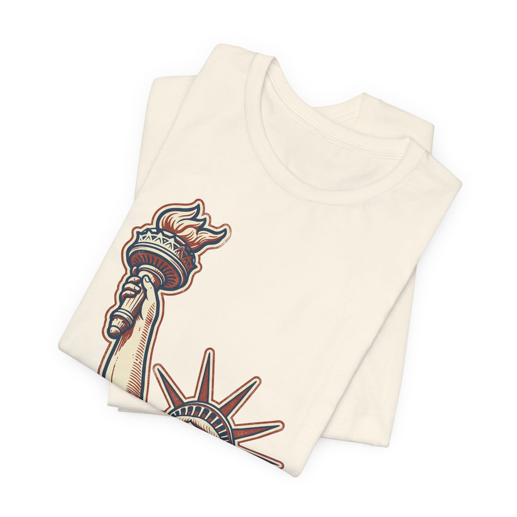 Cream graphic tee with partial Liberty statue illustration print