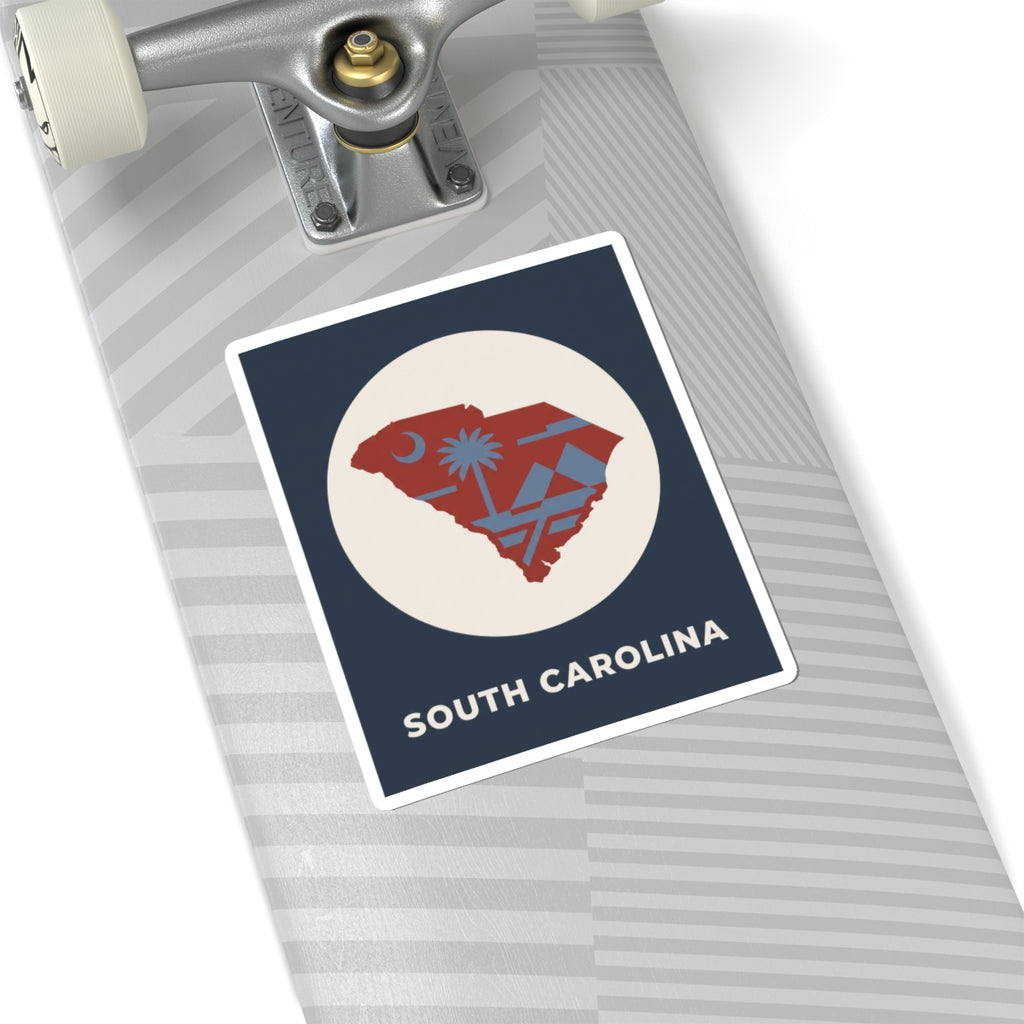 South Carolina map sticker with palm tree graphic and “SOUTH CAROLINA” text on blue square