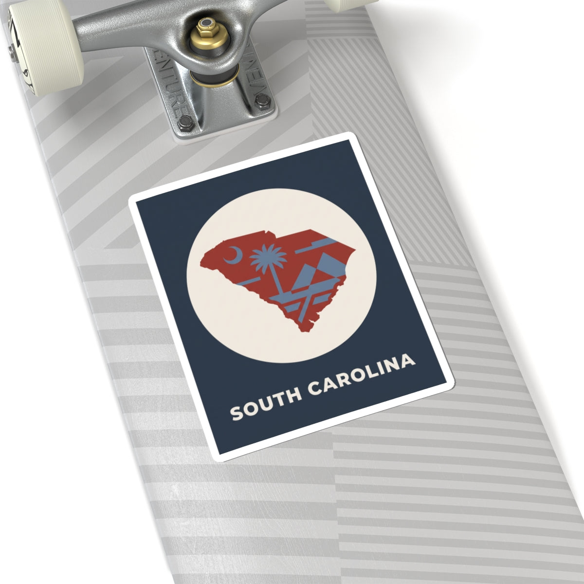 South Carolina map sticker with palm tree graphic and “SOUTH CAROLINA” text on blue square