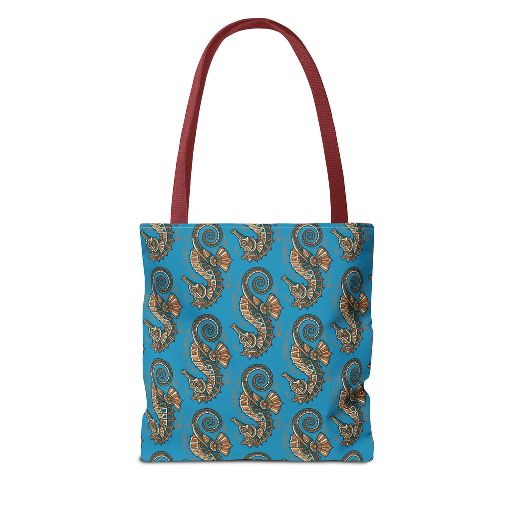Tote bag with blue all-over seahorse pattern and red shoulder handles
